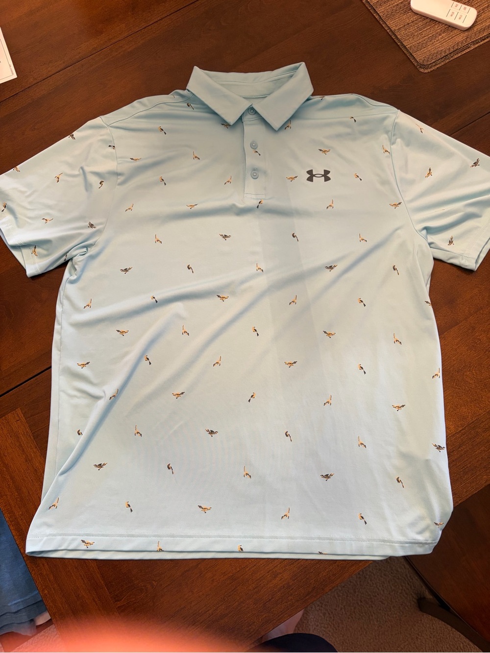Under Armour Light Blue Polo with Small Bird Motif